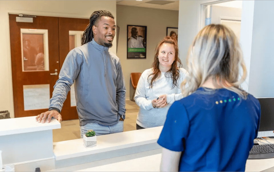 doctor discussing regenerative medicine treatment with patients