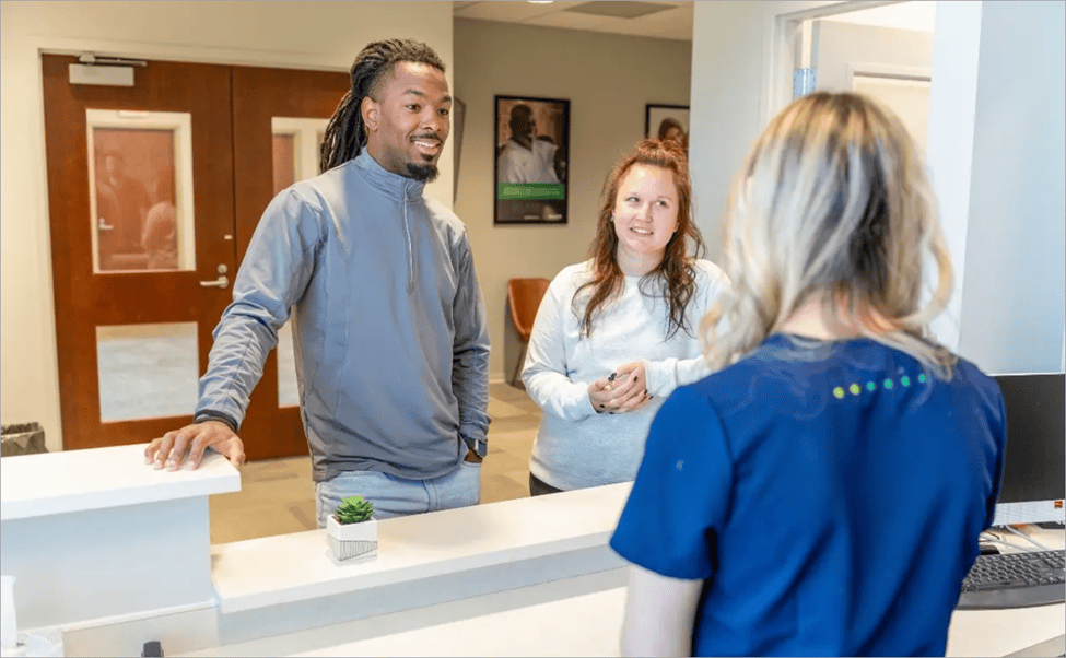 doctor discussing regenerative medicine treatment with patients