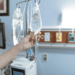 Athlete receiving IV therapy in a modern Scottsdale wellness clinic for hydration, recovery, and performance support in a desert climate.