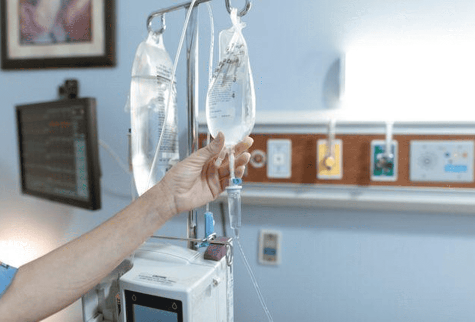 Athlete receiving IV therapy in a modern Scottsdale wellness clinic for hydration, recovery, and performance support in a desert climate.