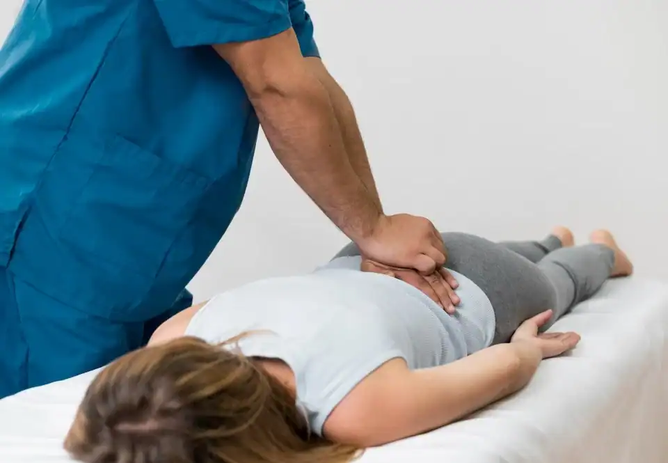 Chiropractic adjustment for workout injury recovery